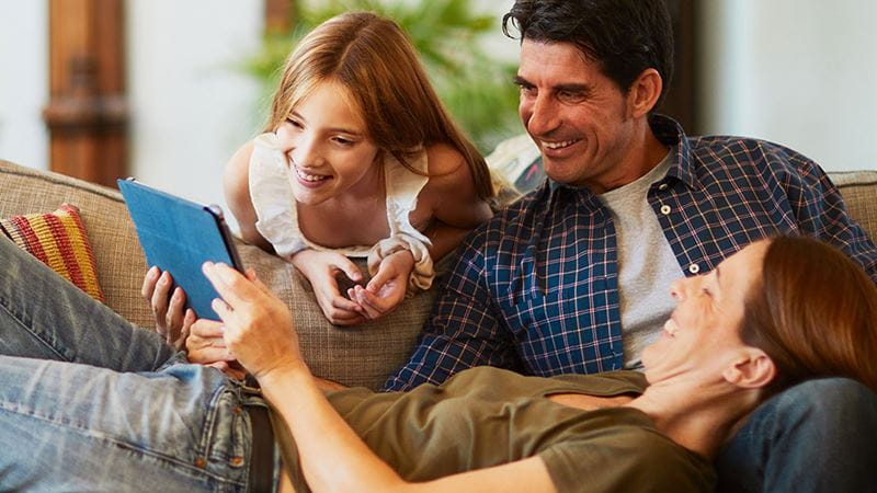 Family looking at ipad