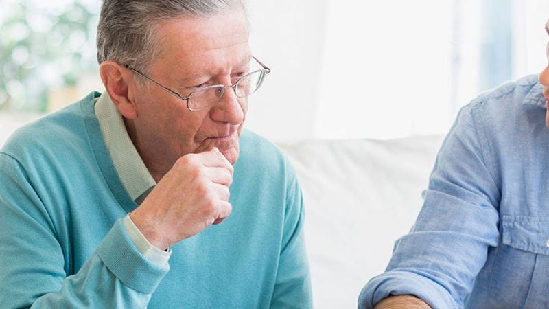 Elderly man thinking