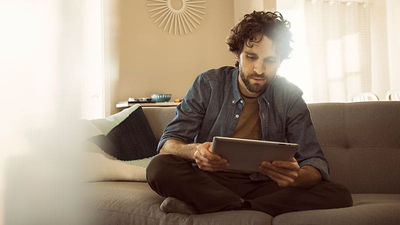 Man on ipad