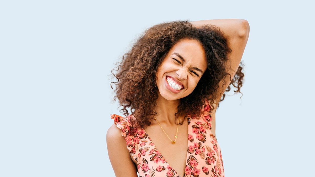 Young woman with big smile