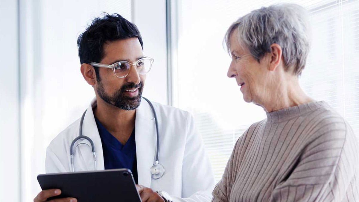 Doctor speaking to patient