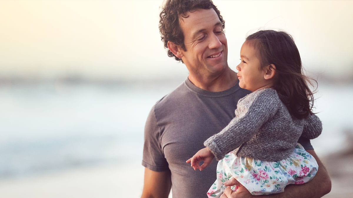 Father holding child