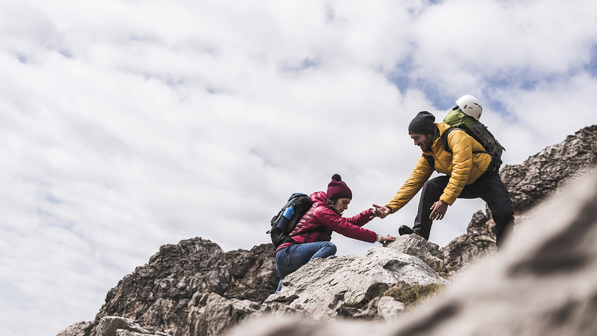 Couple rock climbing