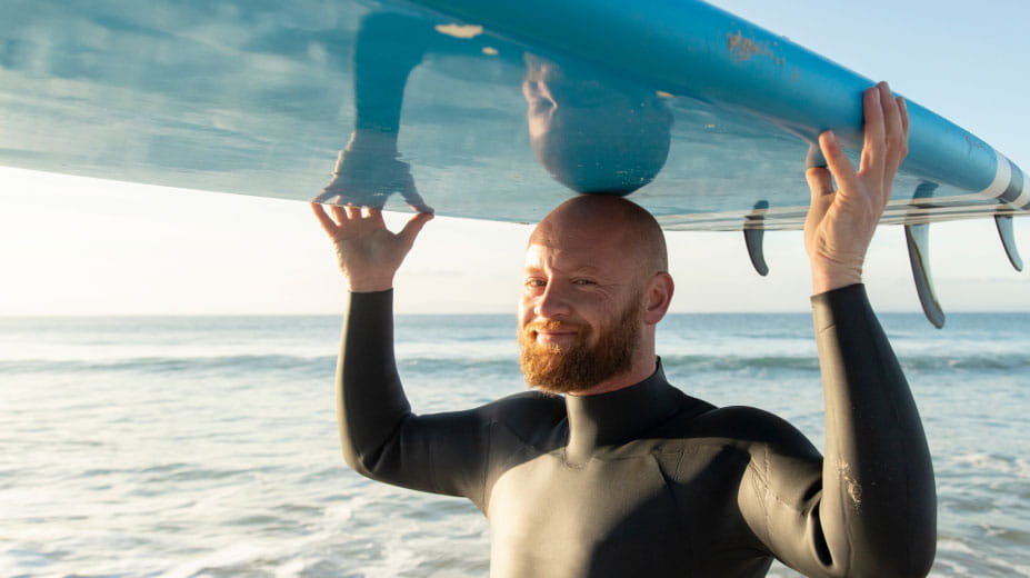 Man with surfboard