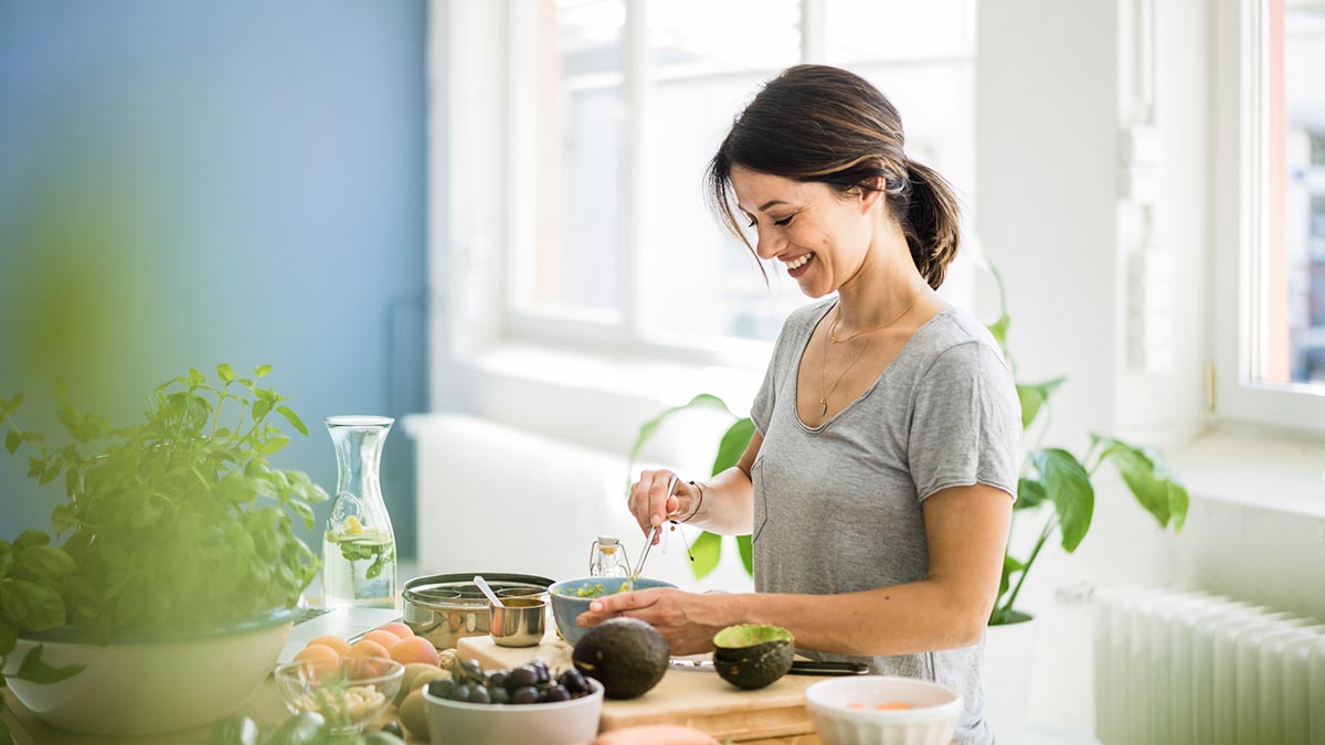 Woman cooking healthy food