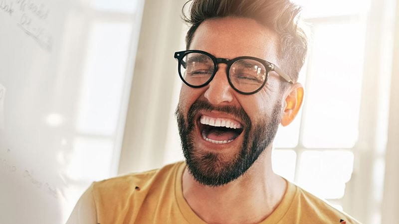 Man with big smile laughing