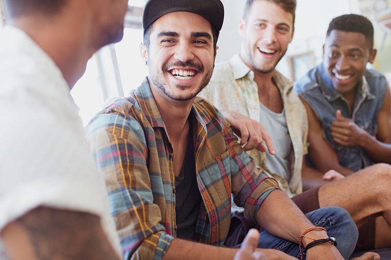 Young men laughing