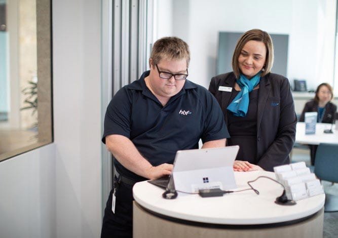 HBF staff at a service desk