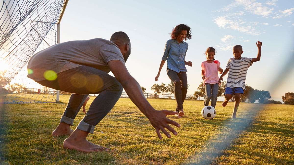 Family playing in park