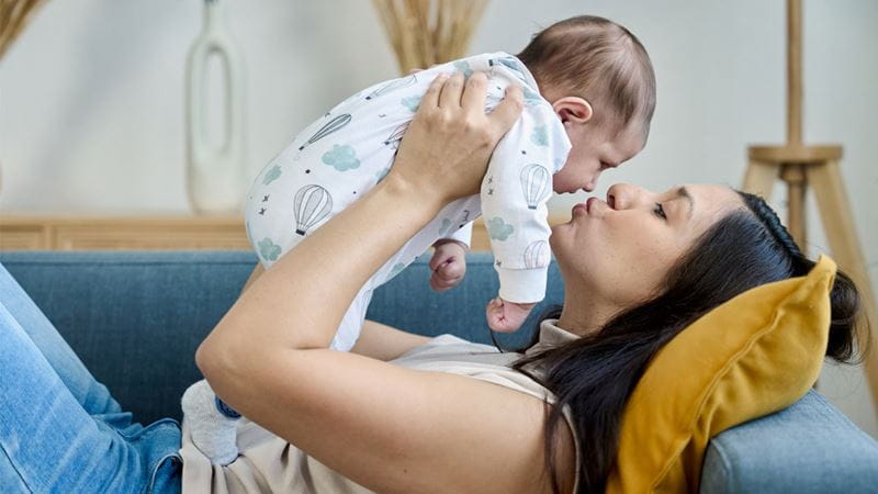 Mother holding child