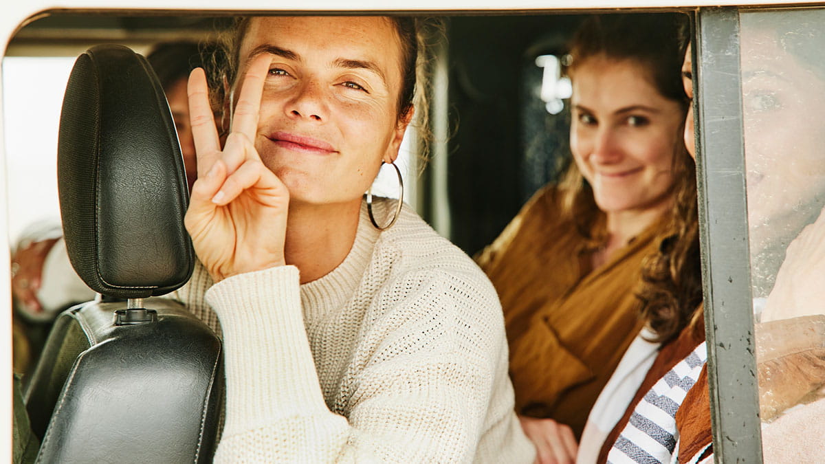 Millenials with health insurance in a car