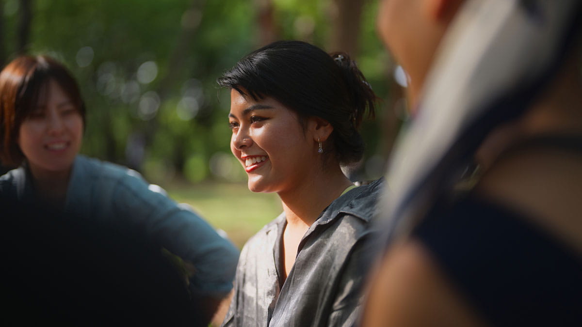 Woman smiling with friends