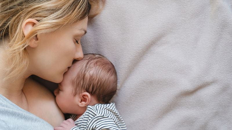 Mother and her breastfeeding baby