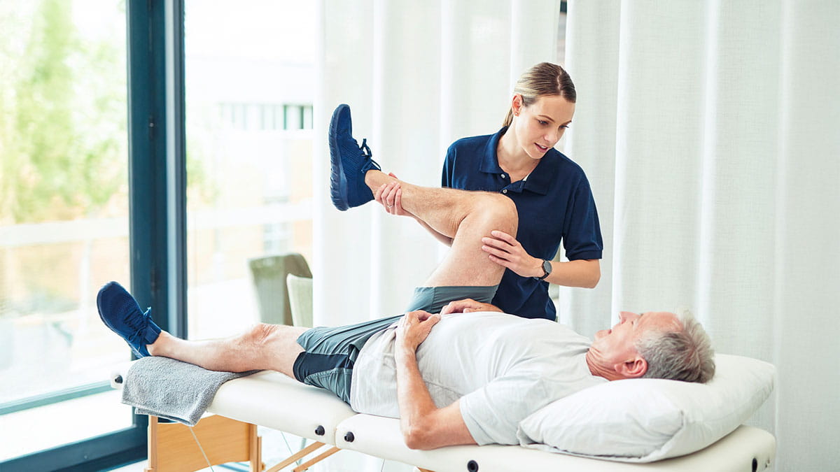 Doctor helping patient 