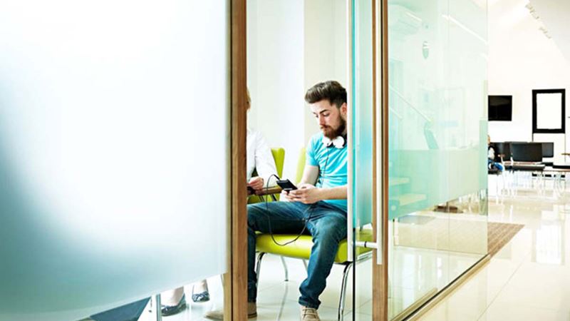 Man on phone in waiting area