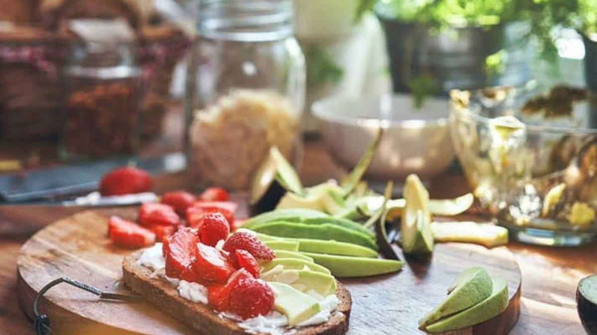 Platter of fresh fruit and vegetables on bread