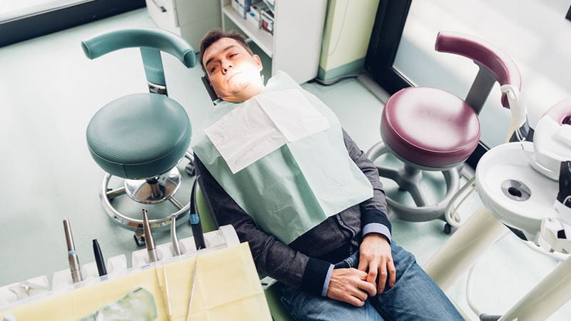 Man getting dental treatment