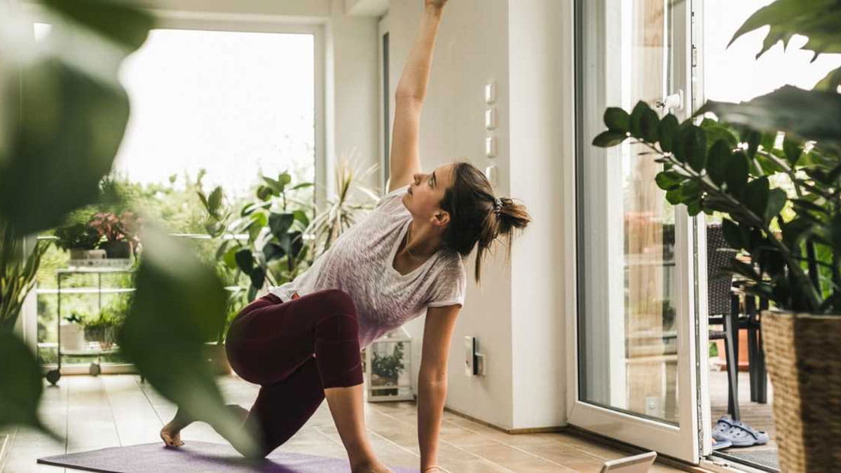 A young woman doing yoga in the morning
