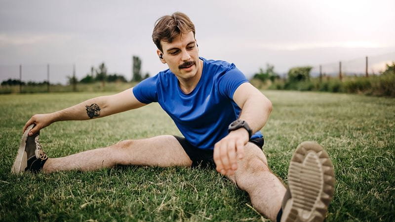 Man stretching after exercise