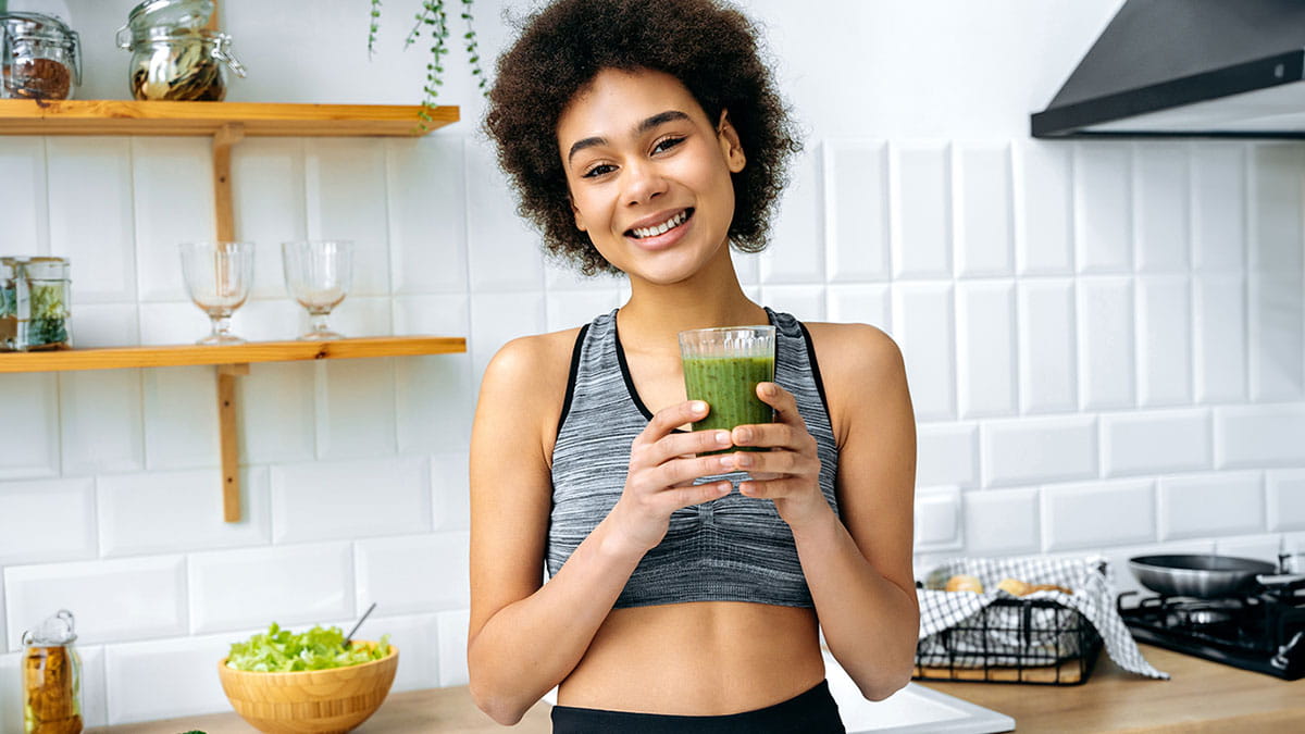 Woman drinking an immune boosting smoothie