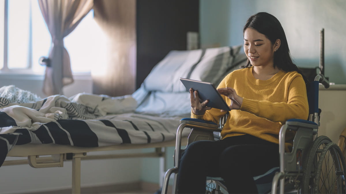 Smiling doctor engaging with parents and toddler in private hospital