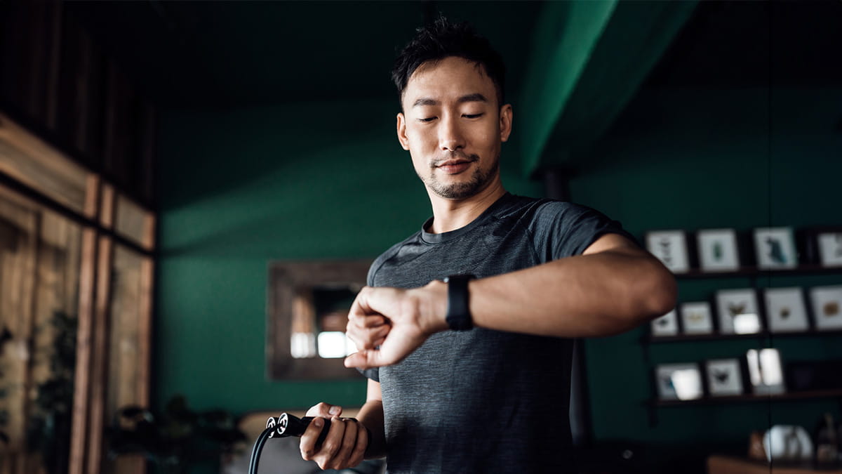 Man checking his fitness watch