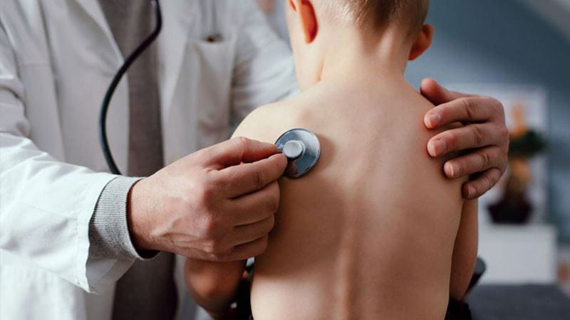 Child having doctor's examination