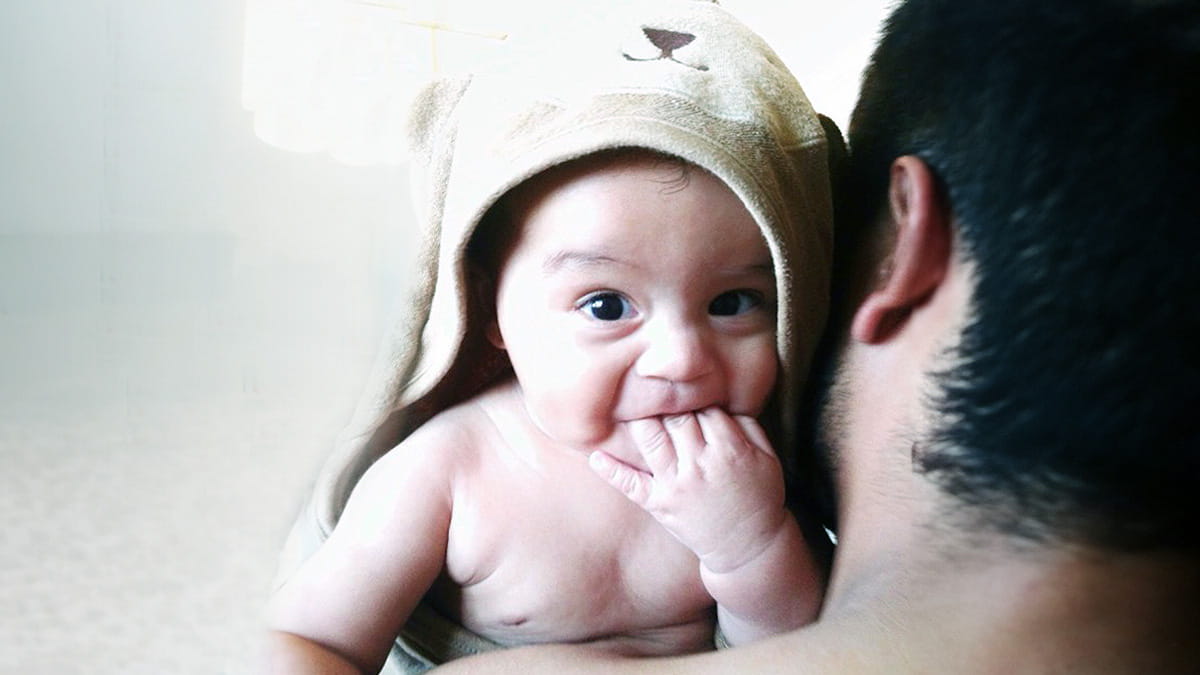 Father holding baby
