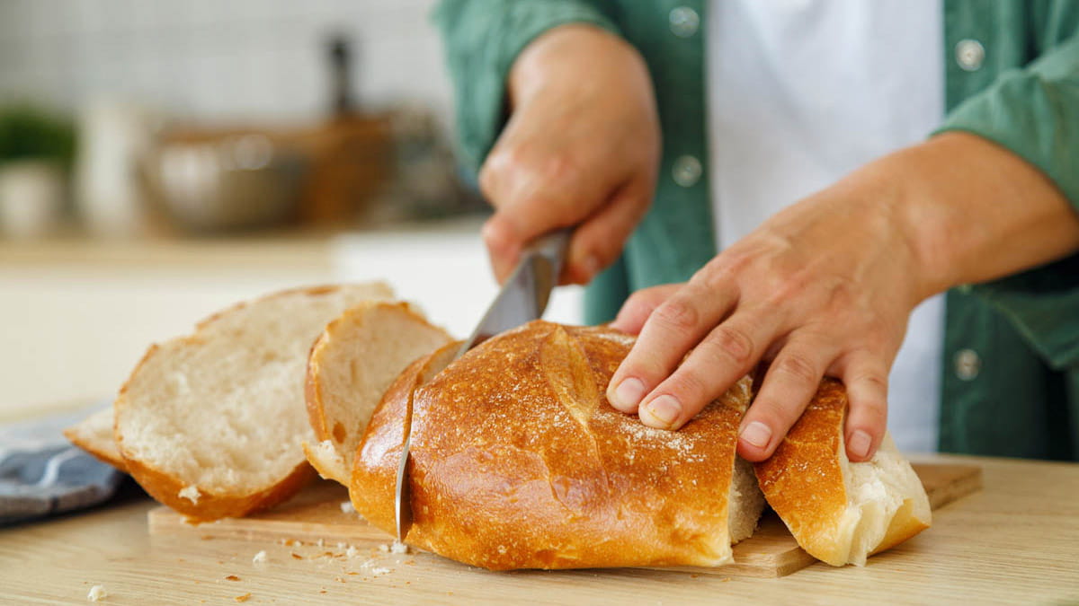 Cutting a loaf of bread