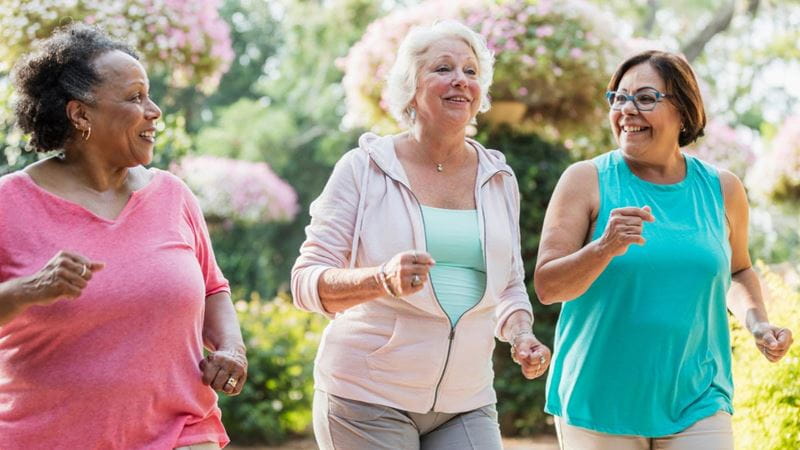 Women in their 60s power walking