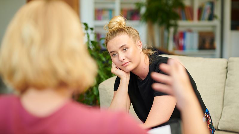 Mother and daughter talking to eachother