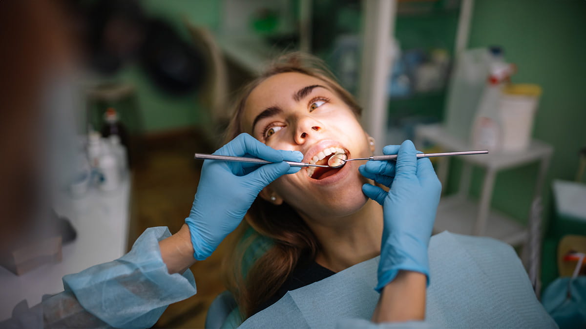 Dentist working on patient