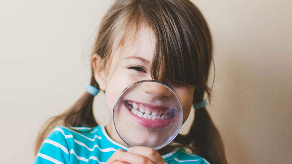 Child giving a big toothy smile