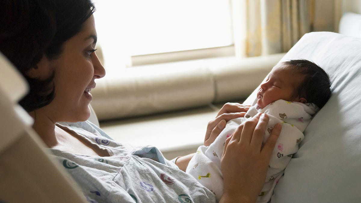 Mother with newborn baby