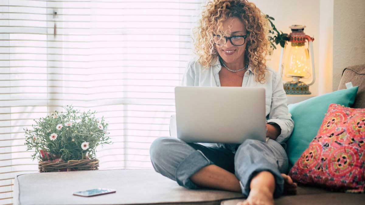 Woman comparing Extras options on laptop