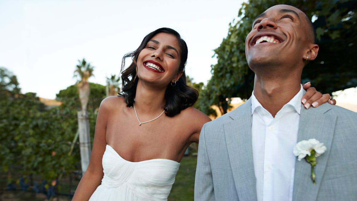 Newly weds smiling