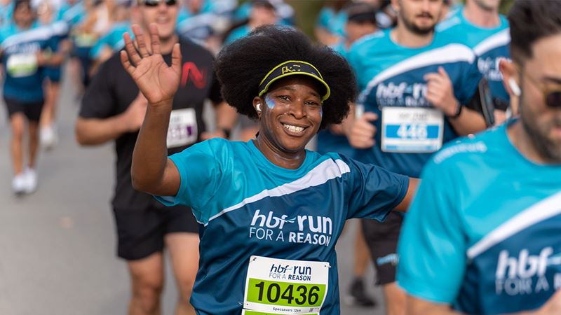 Woman smiling after finishing race