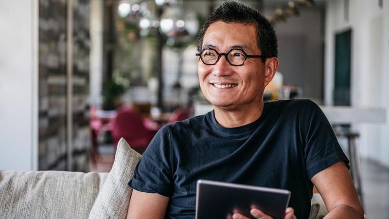 Man smiling with glasses