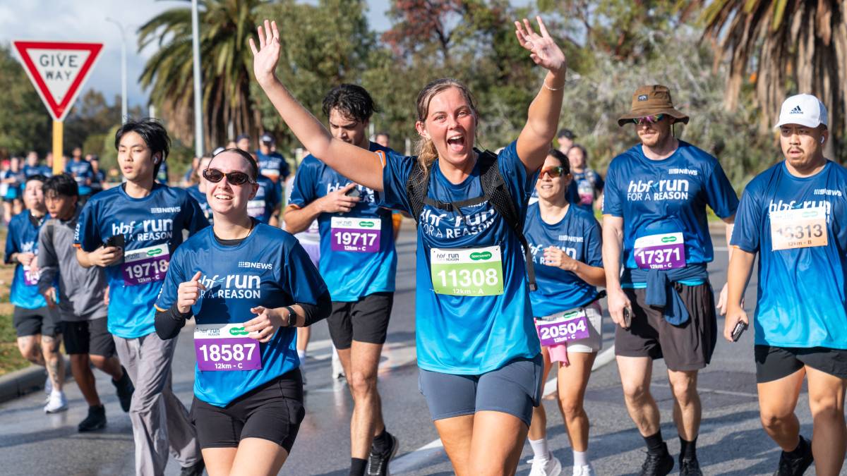 Female participant running in the Specsavers 12km