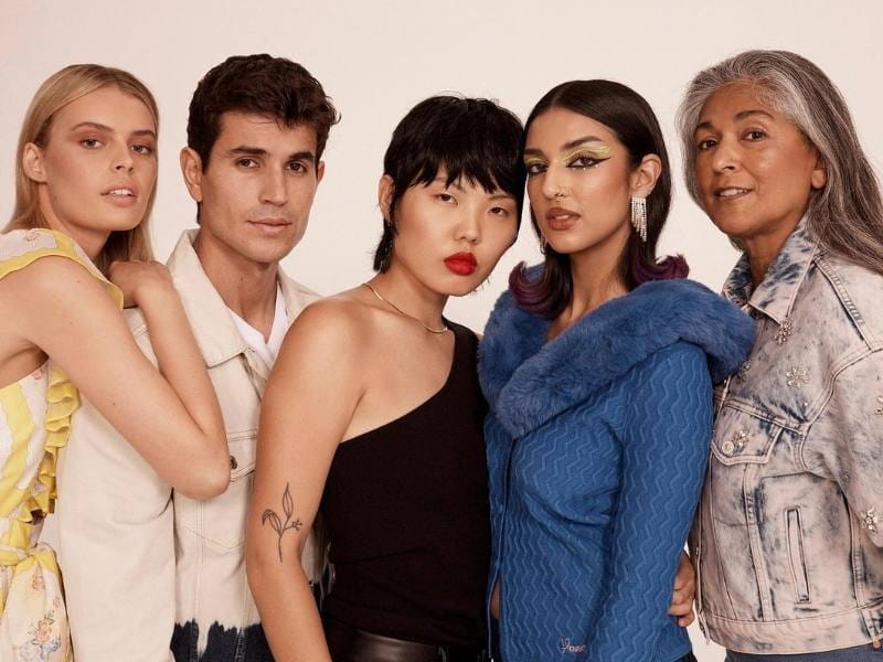 Five models looking at the camera