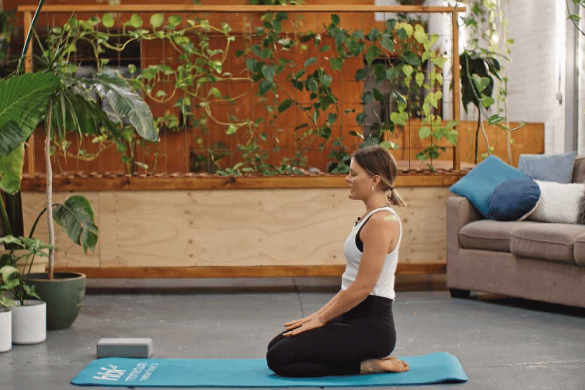 Woman doing yoga seated rest