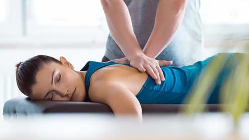 Woman getting remedial massage