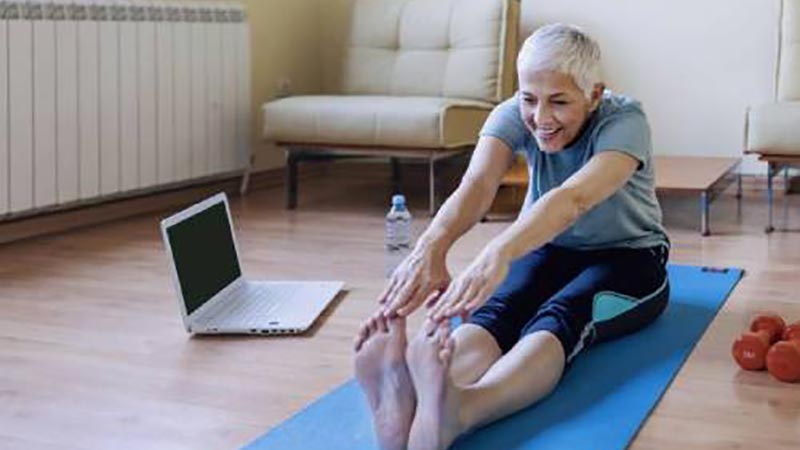Woman doing yoga at home