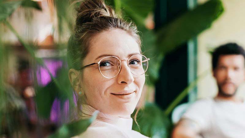 Woman smiling with glasses