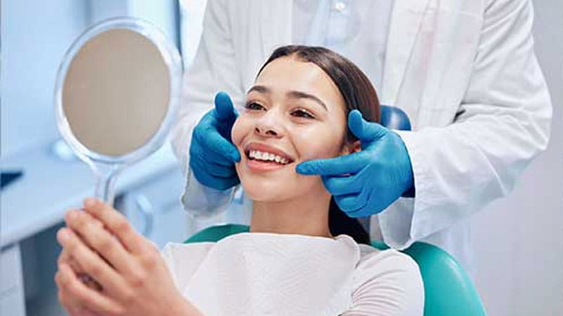 Woman smiling at the dentist