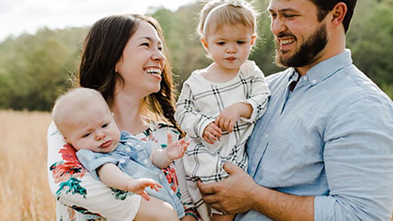Young family in a field