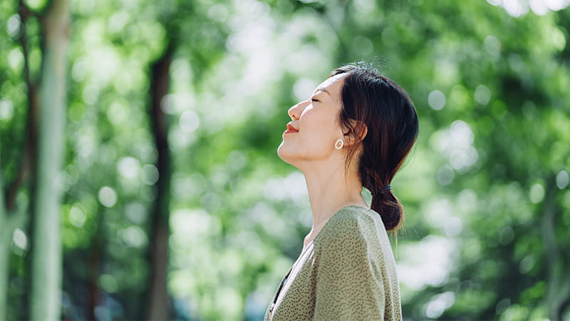 Woman relaxing in a forrest