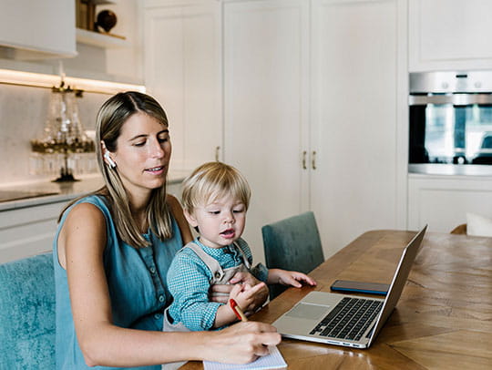 Mother and child on laptop