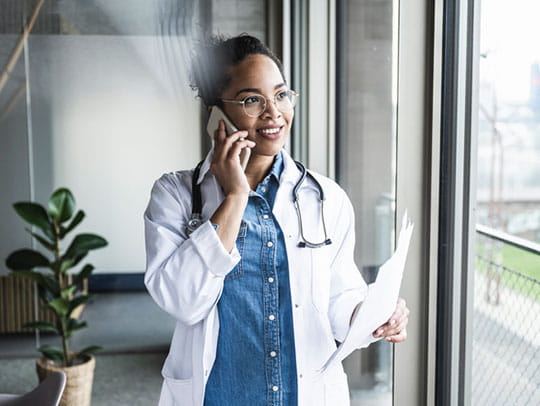 Doctor on mobile phone