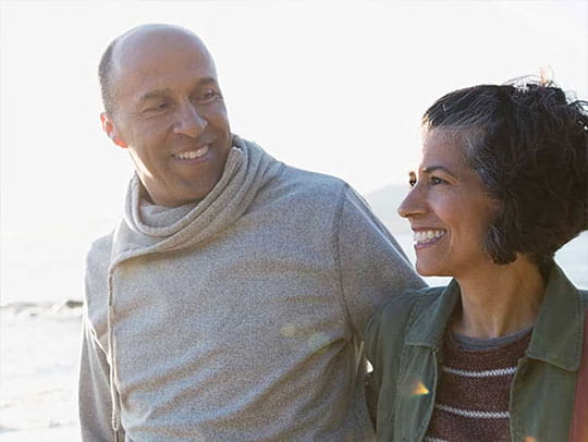 Couple walking on beach